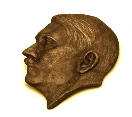 Appraisal: Lot consists of a cast metal facsimile of Hitler's face