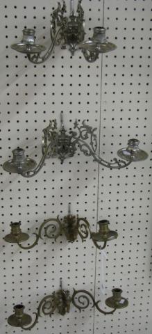 Appraisal: Four cast metal wall candle sconces two in brass finish