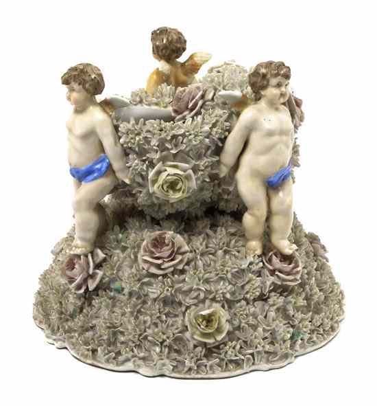 Appraisal: A German Porcelain Figural Centerpiece having three cherubs and the