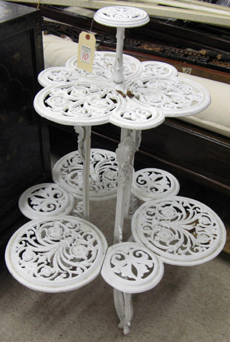 Appraisal: A VICTORIAN STYLE CAST IRON PLANT STAND American th century