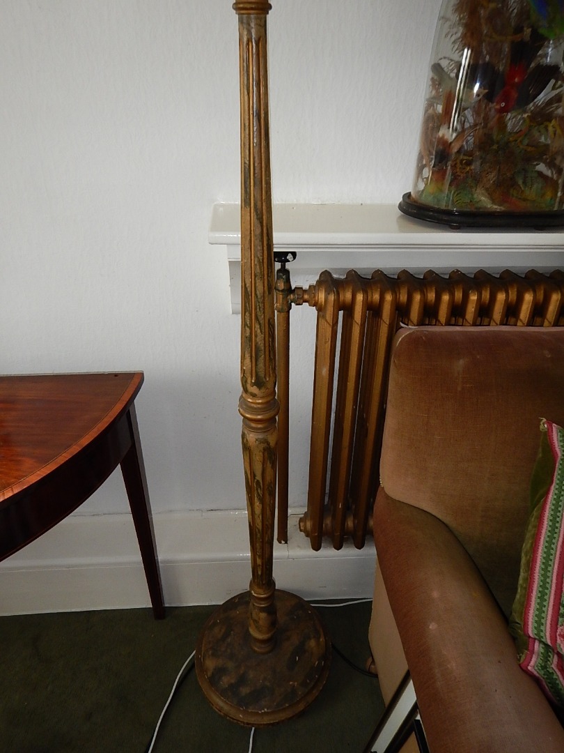 Appraisal: A mottled gilt painted floor lamp with reeded and figured