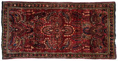 Appraisal: Sarouk rug typical floral designs on burgundy field ft x