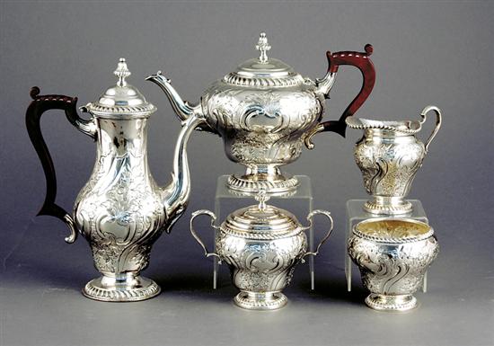 Appraisal: English silverplate tea and coffee service chased floral pattern consisting