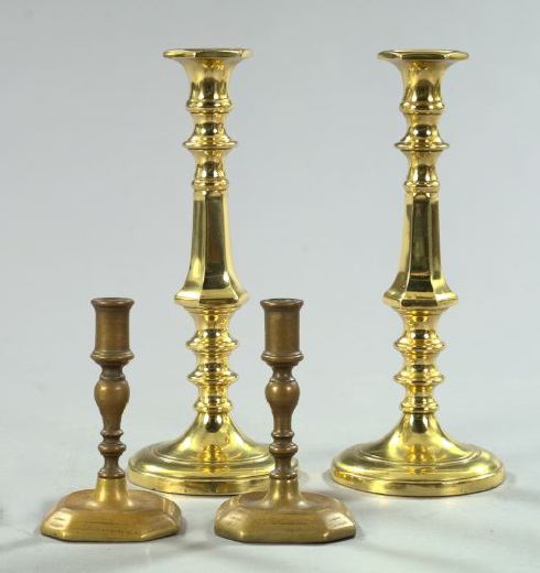 Appraisal: Two Pairs of Brass Candlesticks consisting of a tall pair