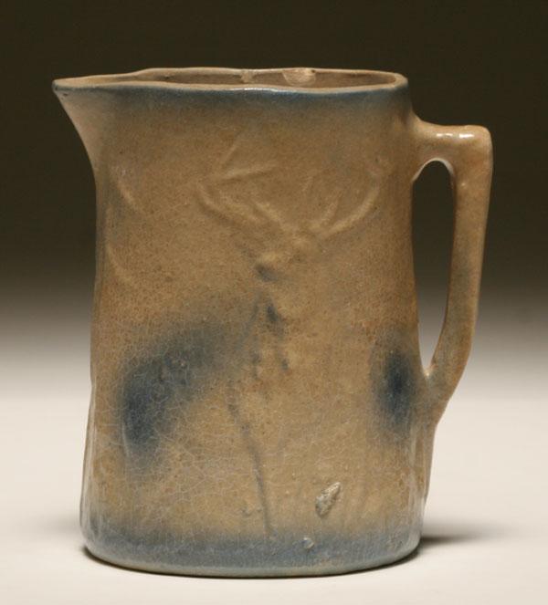 Appraisal: Salt glaze stoneware blue and white milk pitcher with embossed