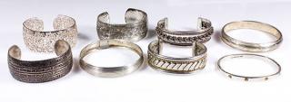 Appraisal: Lot of silver bangle bracelets Lot of silver bangle bracelets