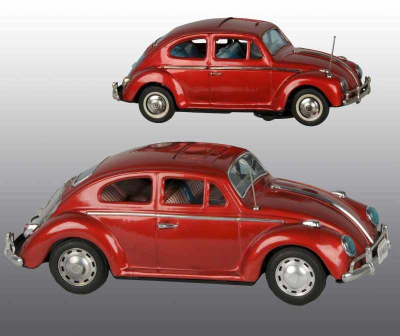 Appraisal: Lot of Tin Volkswagen Battery-Operated Toys Description Japanese Working Both