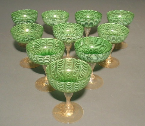 Appraisal: Green swirl glass sherbets or champagnes set of ten with