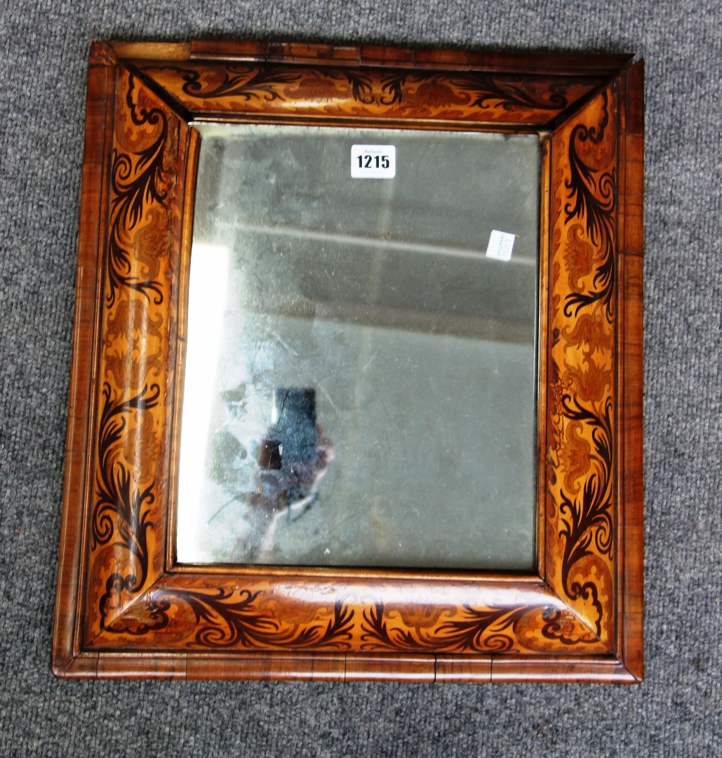 Appraisal: A th century marquetry inlaid cushion framed rectangular wall mirror