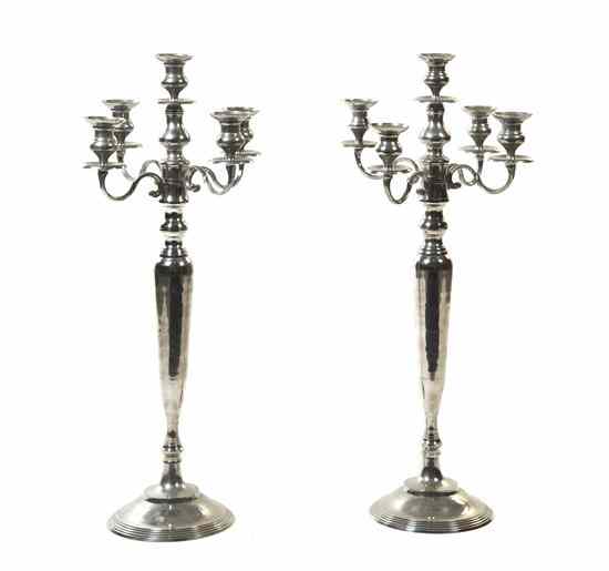 Appraisal: A Pair of Continental Silverplate Five-Light Candelabra having a baluster