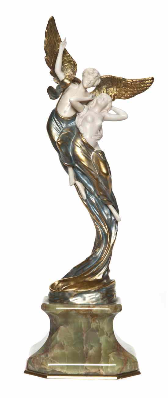 Appraisal: A French Gilt and Silvered Bronze and Ivory Figural Group