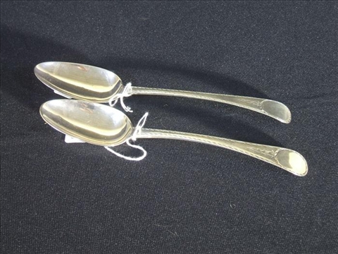 Appraisal: PAIR OF GEORGE IV SILVER BRIGHT CUT SPOONS London -