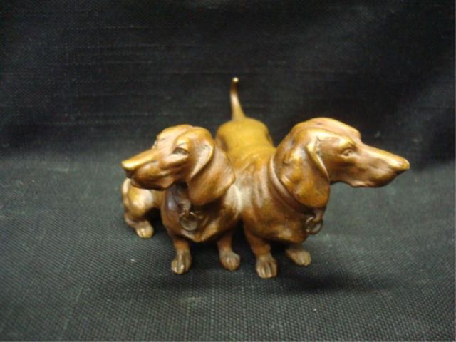 Appraisal: Bronze Sausage Dogs dogs attached From a Port Washington NY