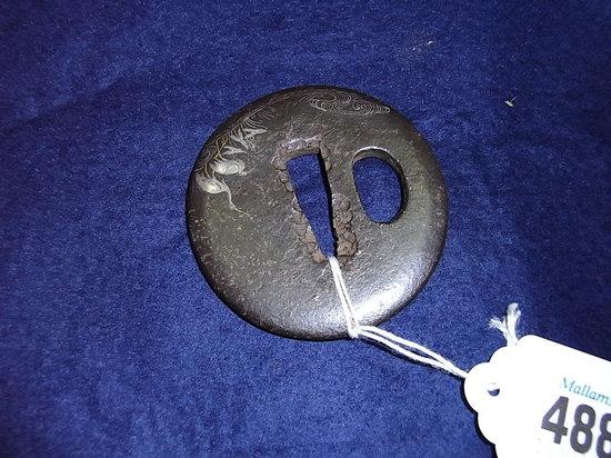 Appraisal: A JAPANESE IRON TSUBA inlaid with silver stalks