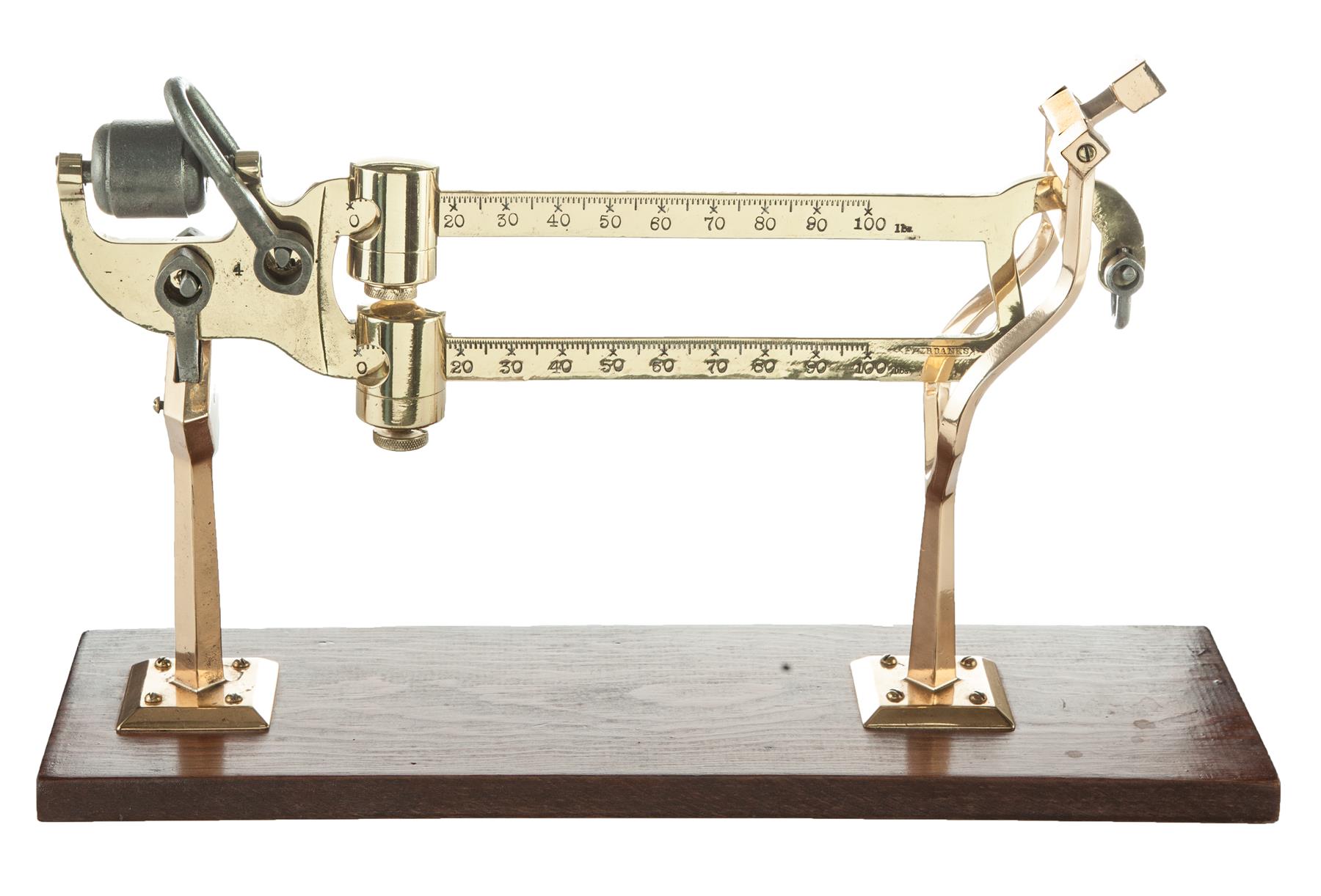 Appraisal: FAIRBANKS BRASS SCALE American ca Counter top slide-weight scale mounted