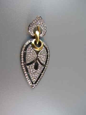 Appraisal: Diamond Pendant over diamonds totaling carats in a fancy pierced