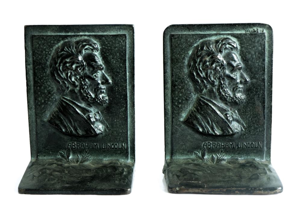 Appraisal: PAIR CAST IRON ABE LINCOLN BOOKENDSPair of cast iron bookends