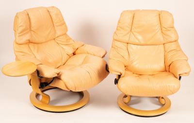 Appraisal: A pair of Ekornes Stressless chairs in salmon coloured leather