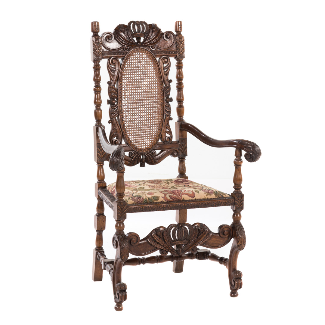 Appraisal: Jacobean Revival walnut high-back armchair early th century scroll carved