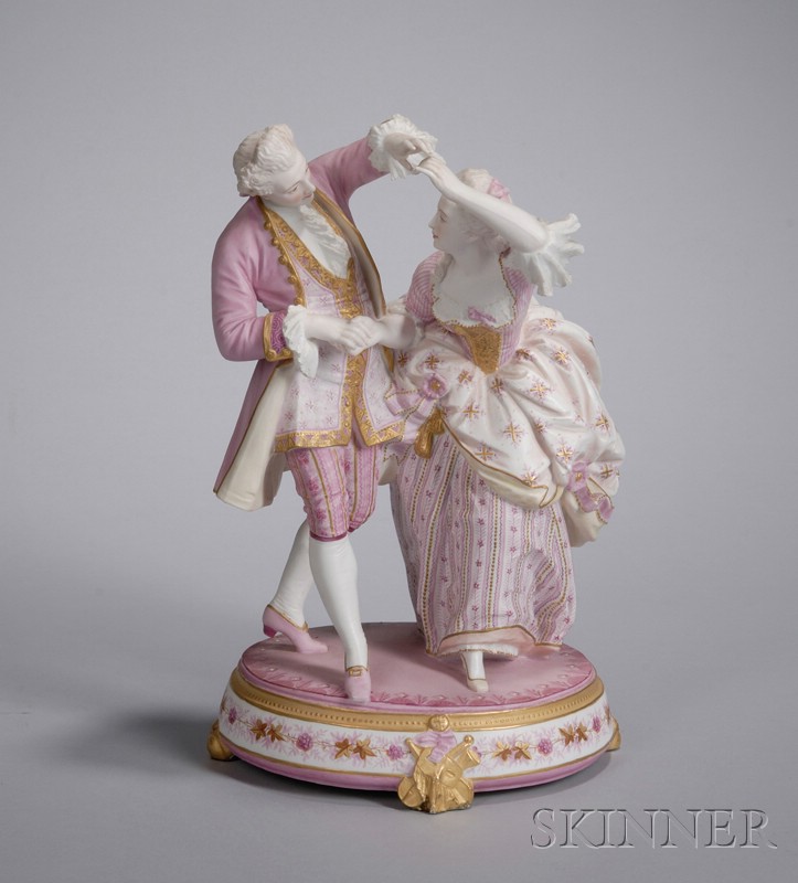 Appraisal: German Gilt and Hand-painted Bisque Dancing Couple Figural Group footed