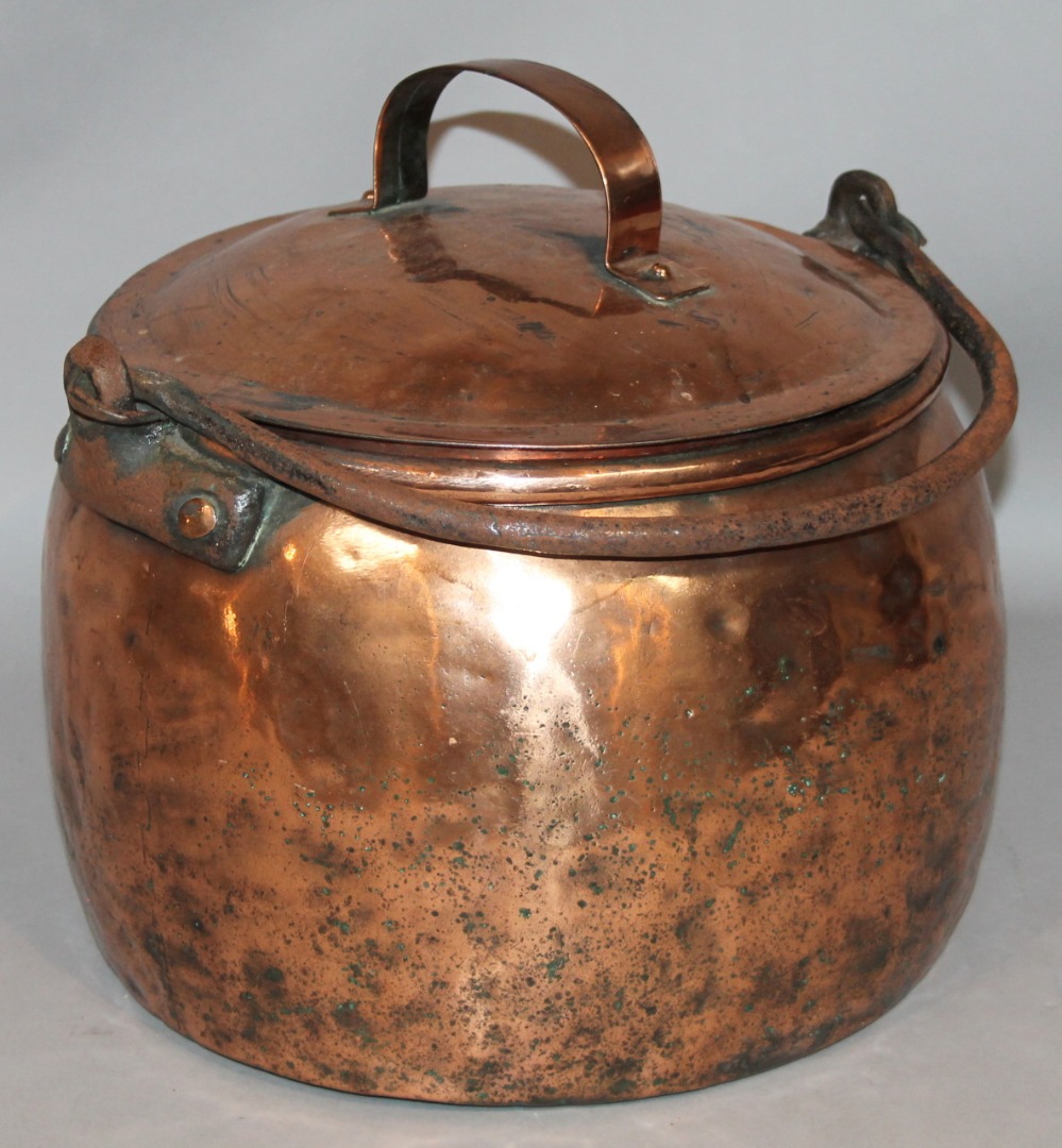 Appraisal: A mid- thC copper pot of circular outline with a