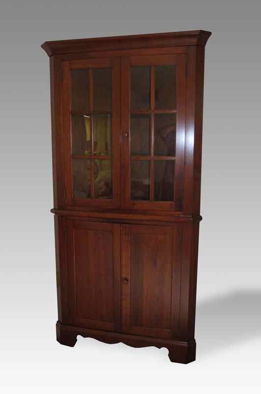 Appraisal: CHERRY CORNER CUPBOARD th century production panel glass top section