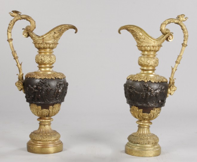 Appraisal: Bronze and gilt bronze central portion featuring putti ring around