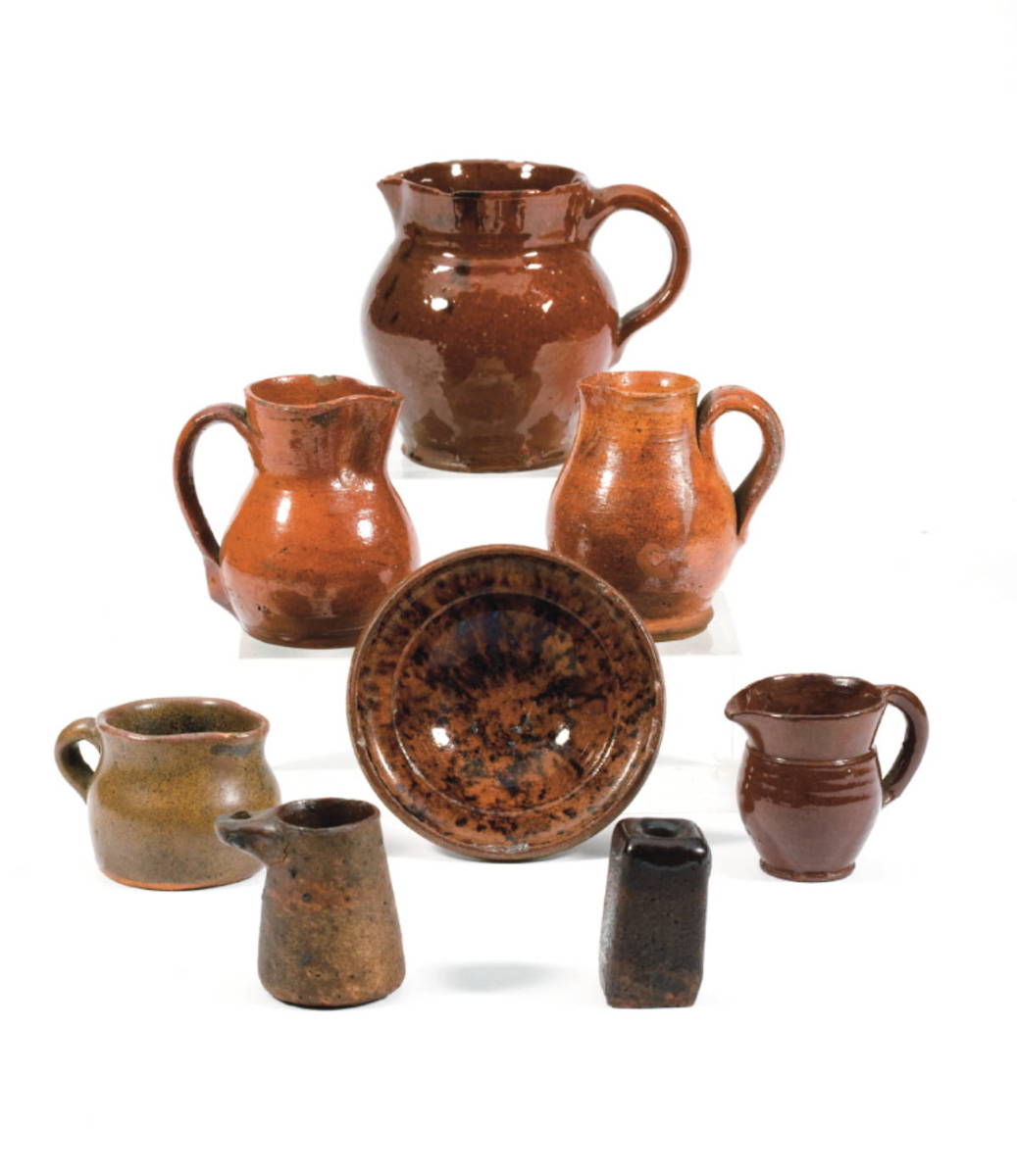 Appraisal: FOUR GLAZED REDWARE AND STONEWARE CREAM PITCHERS AND A MINIATURE