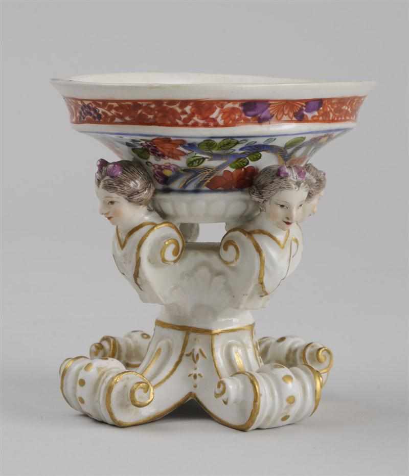 Appraisal: MEISSEN TYPE PORCELAIN FOOTED SALT The oval floral-decorated bowl with