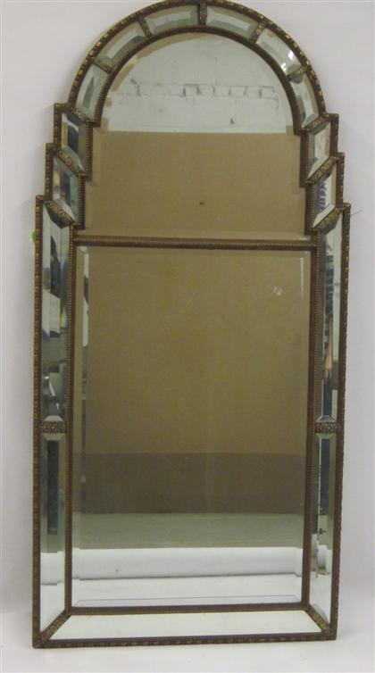 Appraisal: Continental giltwood wall mirror The divided mirror plate enclosed by