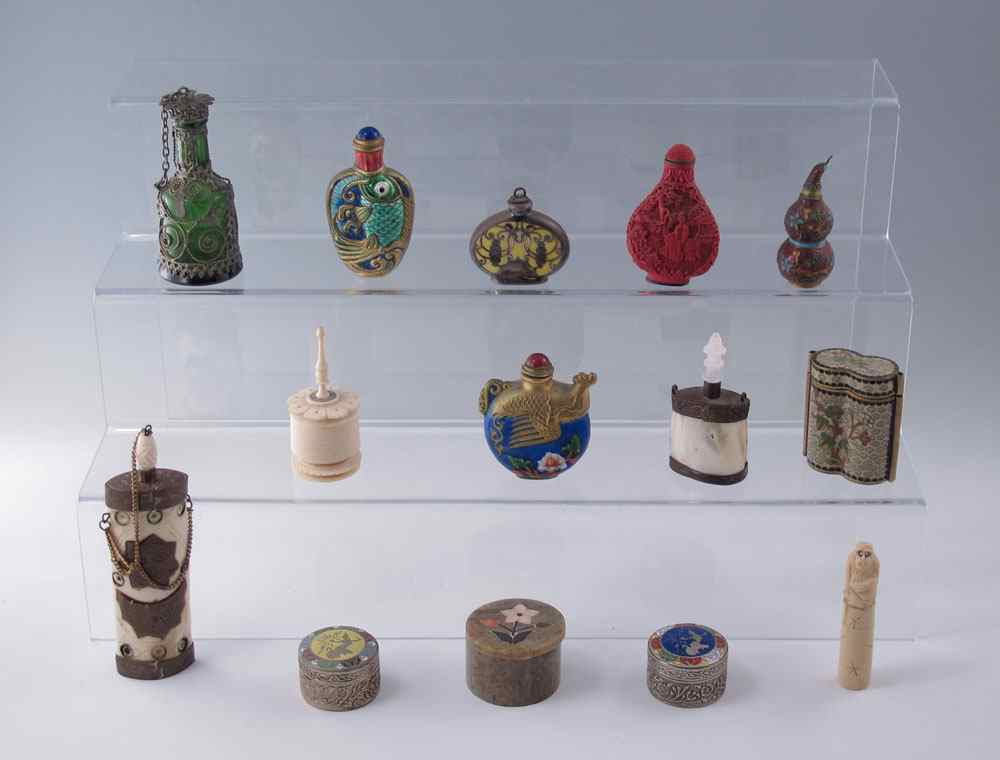 Appraisal: COLLECTION OF SNUFF BOTTLES COVERED JARS To include An assortment