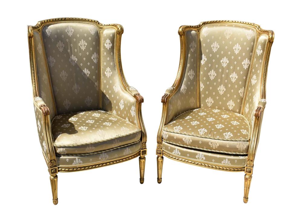 Appraisal: PAIR LOUIS XVI STYLE GILTWOOD BERGERE A LA REINEThe upholstered