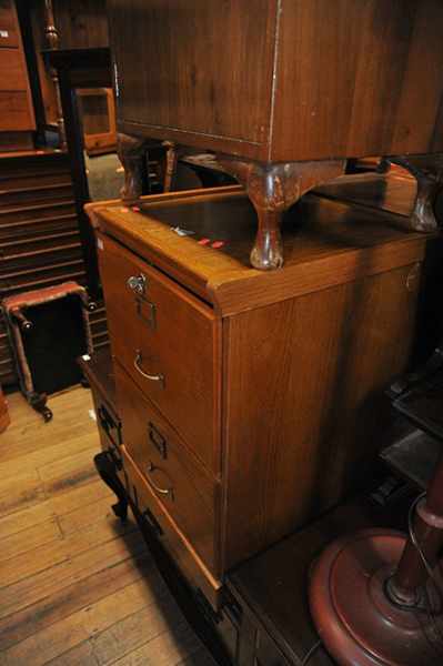 Appraisal: A TWO DRAWER OAK FILING CABINET key in office