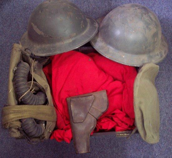 Appraisal: Two tin helmets sundry flags a gas mask etc