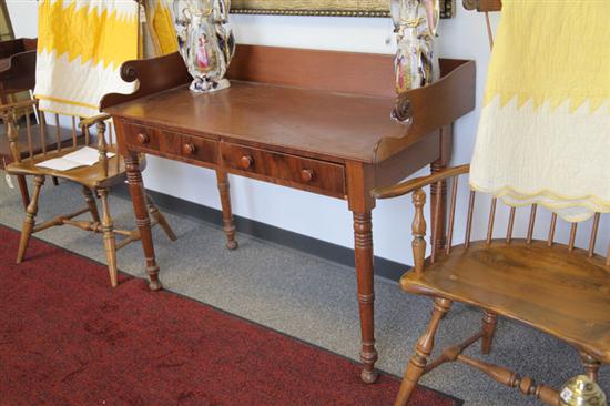 Appraisal: LIBRARY DESK Walnut with flame grain mahogany veneer drawer fronts