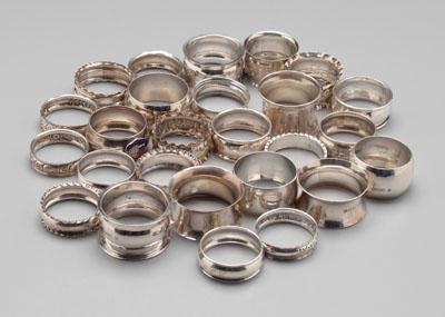 Appraisal: English silver napkin rings most with flared or crimped rims