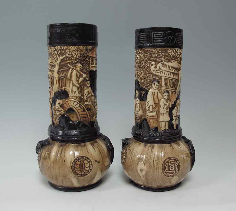 Appraisal: PAIR BRETBY EARTHENWARE TALL VASES Burton on Trent England Impressed