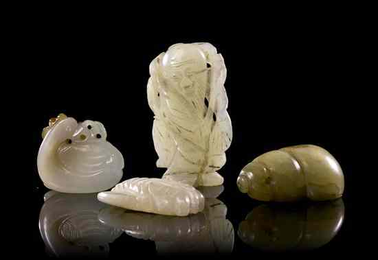 Appraisal: A Group of Four Jade Figural Carvings comprising a cicada