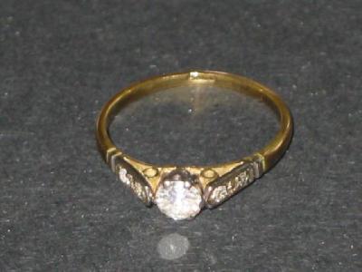 Appraisal: A SOLITAIRE DIAMOND RING the brilliant cut stone approximately cts