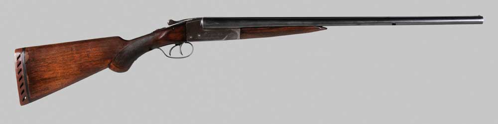 Appraisal: Ithaca Double-Barrel ga Shotgun checkered walnut stock with fine old