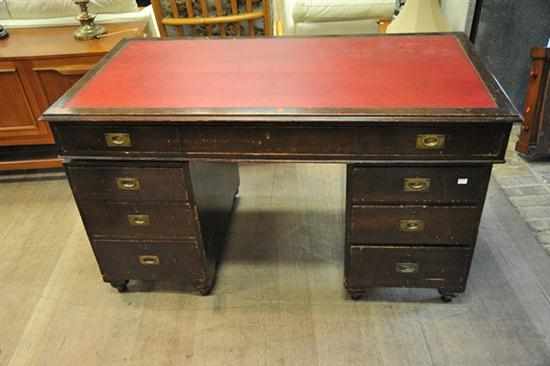 Appraisal: A PEDESTAL KNEE HOLE DESK WITH RED LEATHER INSET TOP