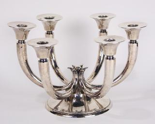 Appraisal: German hand-hammered silver candelabrum the modernist style set with six