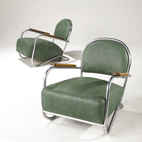 Appraisal: STYLE OF GILBERT ROHDE Art Deco club chairs on tubular