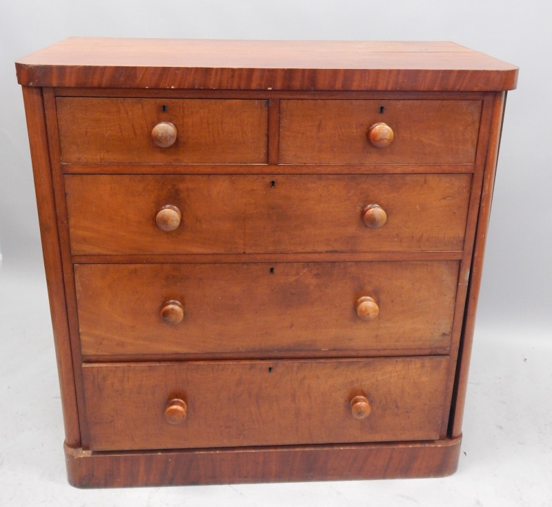 Appraisal: A Victorian mahogany chest of two short and three long