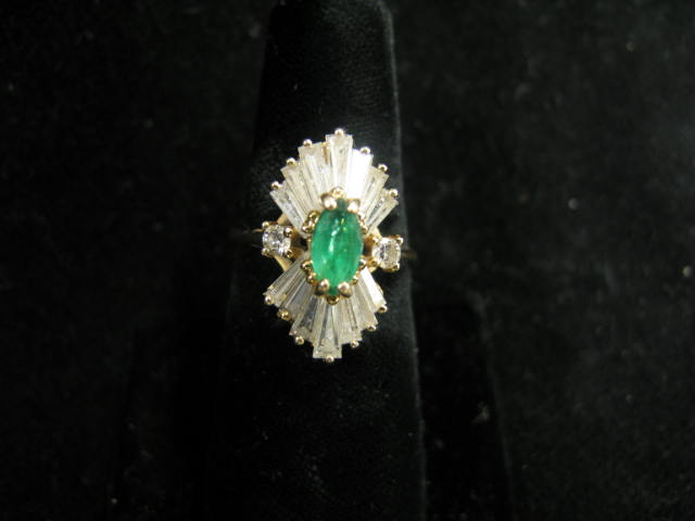 Appraisal: Emerald Diamond Ring carat marquise gem with round full cut