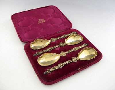 Appraisal: A cased set of four Victorian silver-gilt serving spoons pierced