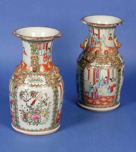 Appraisal: A PAIR OF CANTONESE FAMILLE ROSE VERTE VASES enamelled in