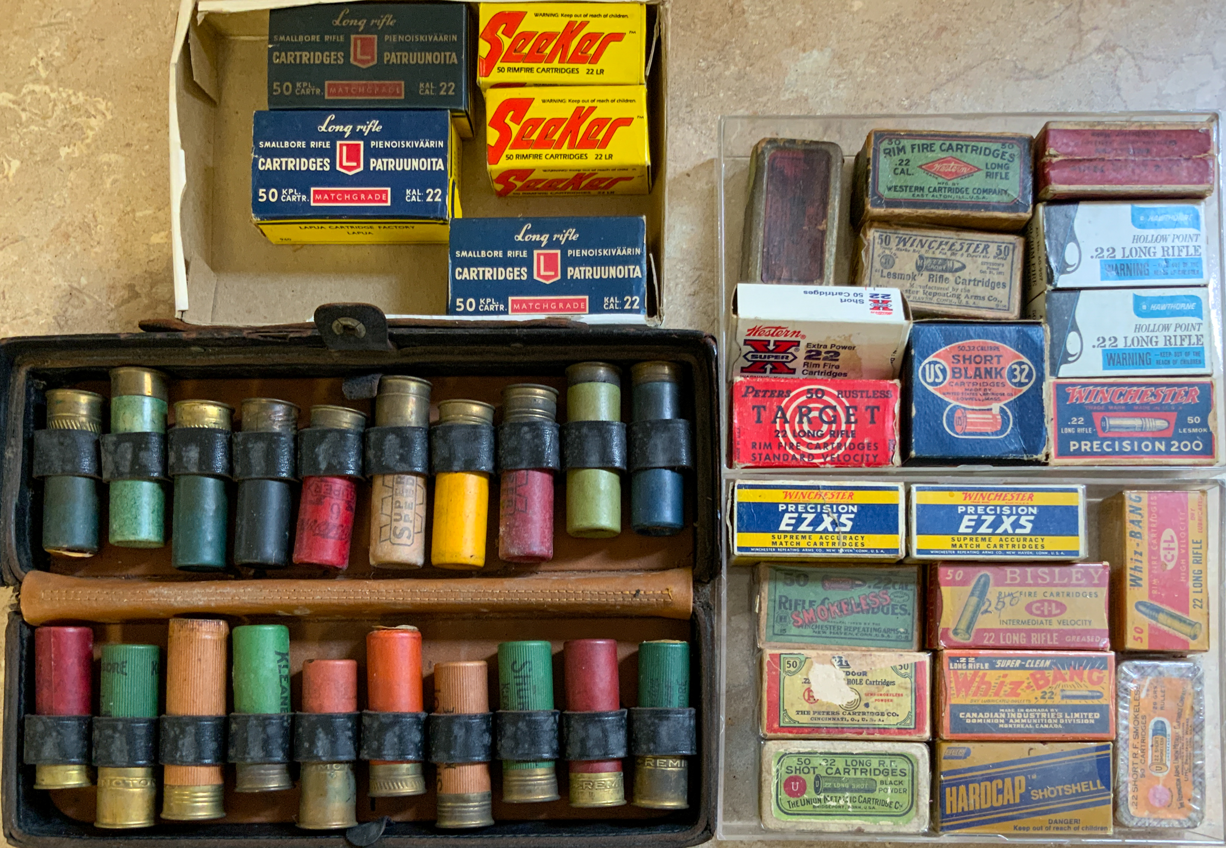 Appraisal: GROUP OF ADVERTISING BOXES AND LEATHER CASES AND SHOTGUN SHELL