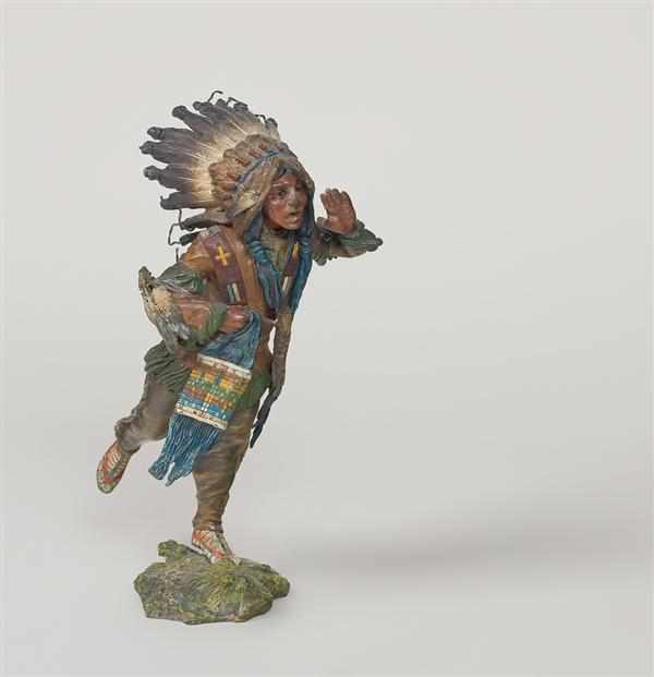 Appraisal: CARL KAUBA Austrian - ''Running Indian'' polychrome bronze signed and