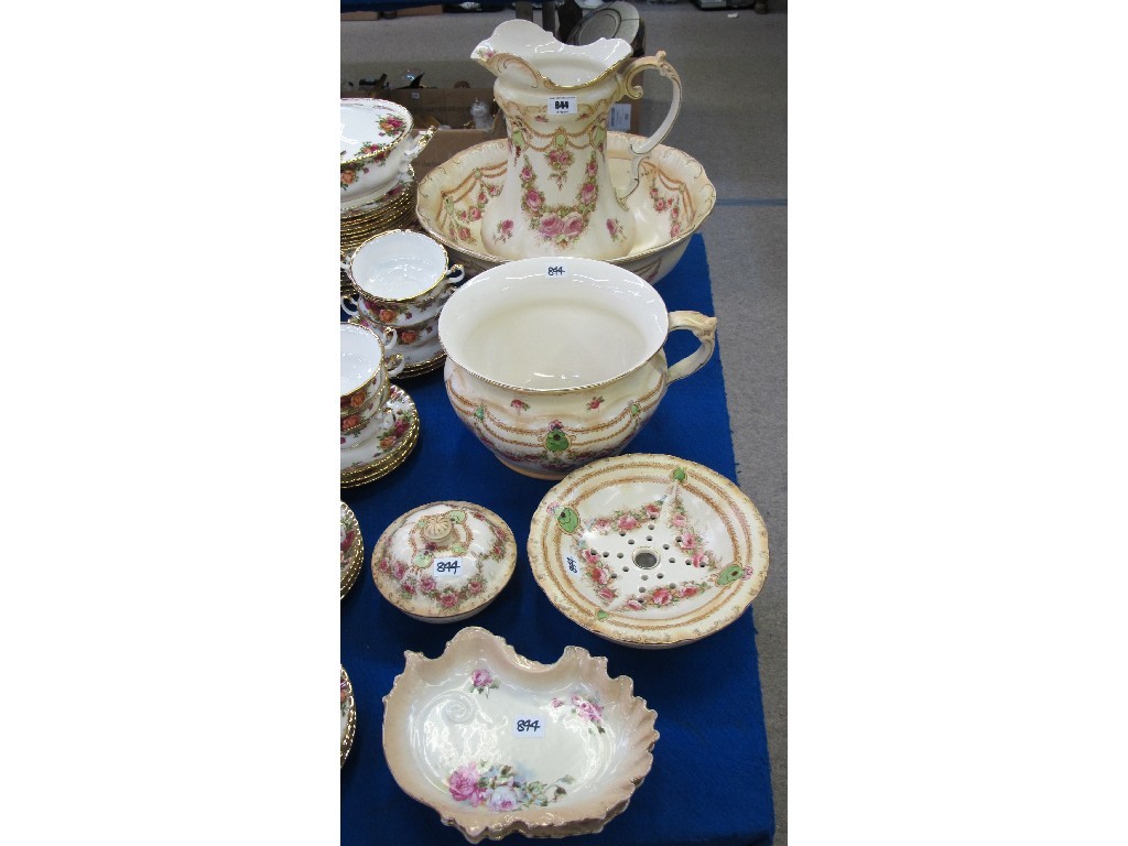 Appraisal: Fieldings 'Garland' pattern wash set comprising ewer basin chamber pot